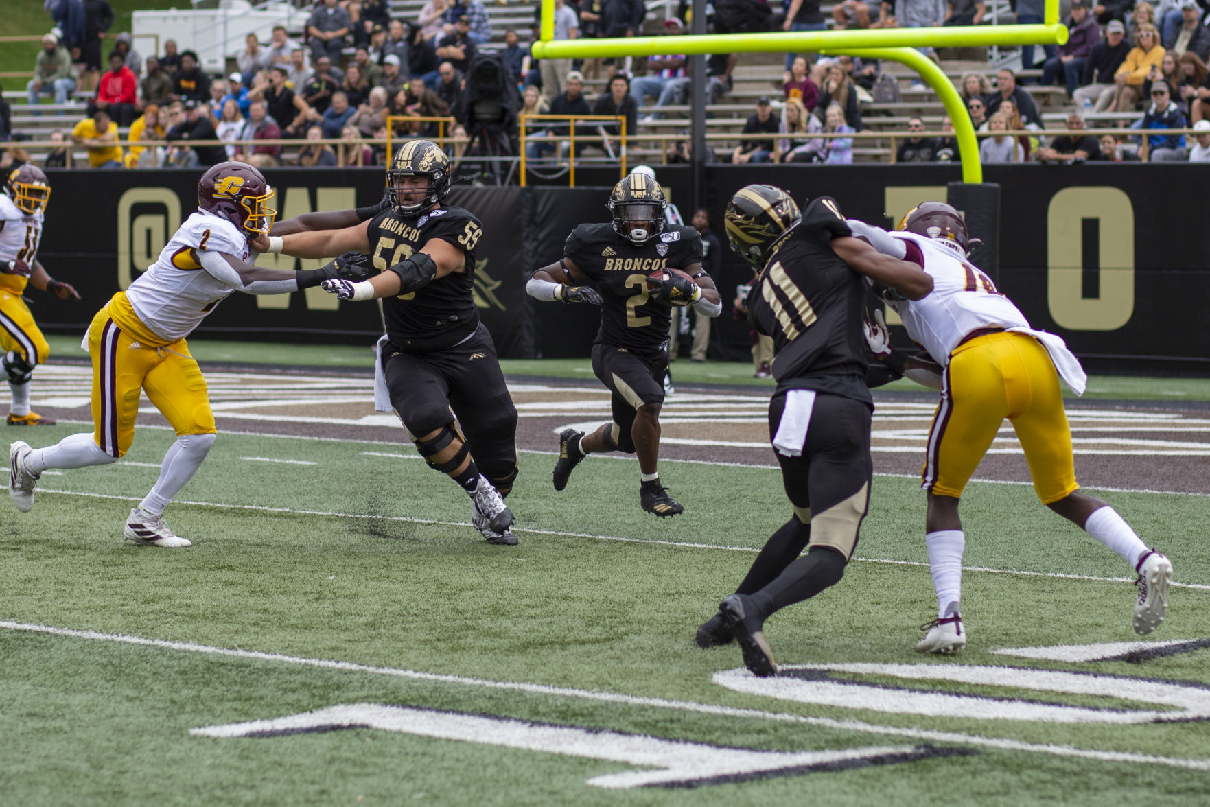 Senior LeVante Bellamy (2) runs the ball against Central Michigan during the first half, Saturday Sept. 28, 2019 at Waldo Stadium.
